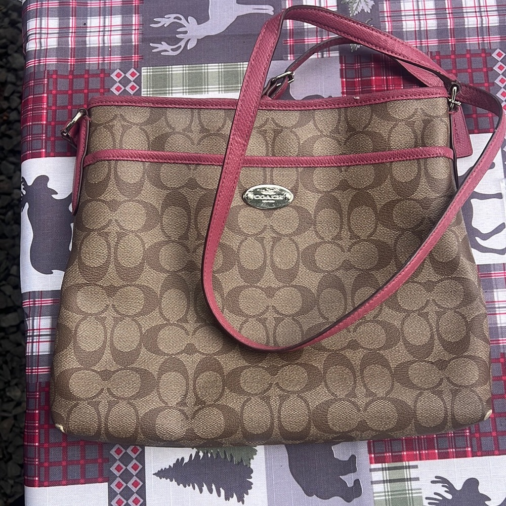 Tan and pink coach purse